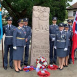 Norwegian group beside Norwegian Stone at North Weald Airfield Memorial in 2019