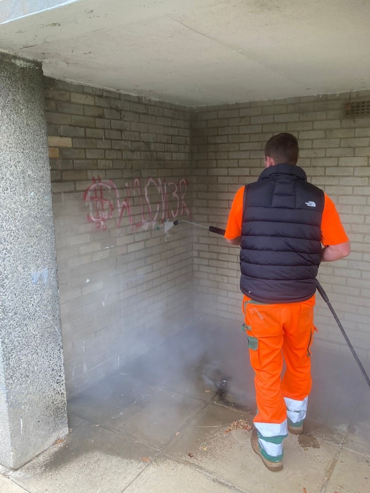 Highway Ranger removing graffiti off the walls