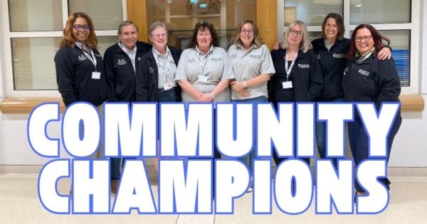 Community Champions posing for a photo in the civic offices in epping